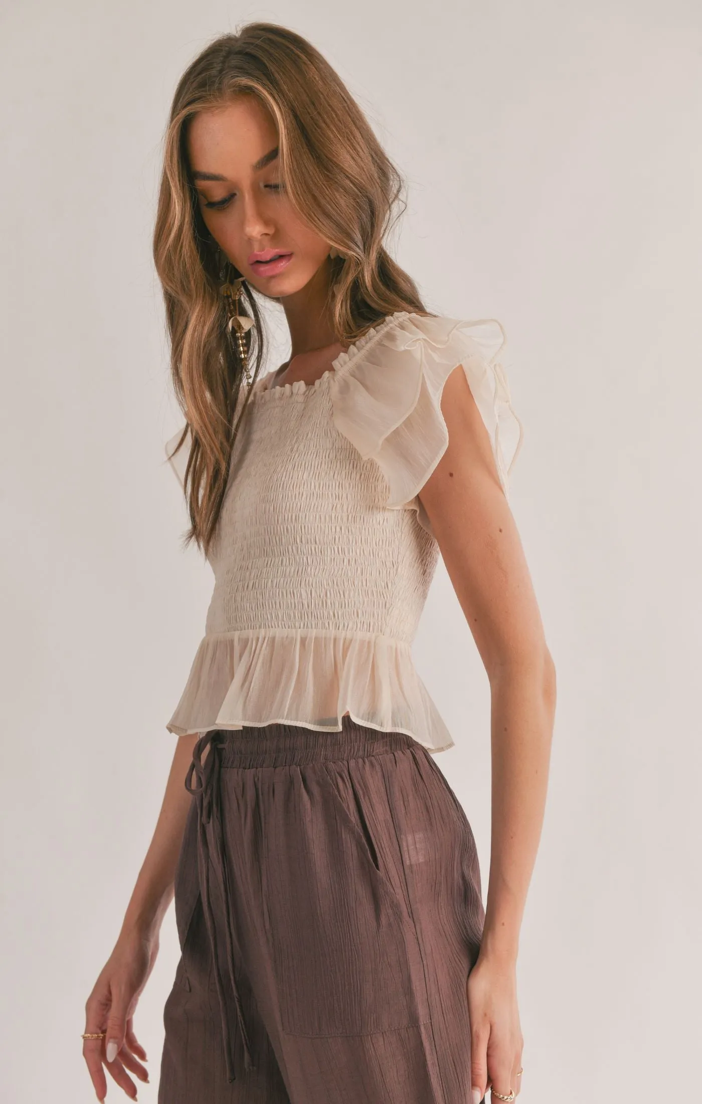 Blurred Smocked Ruffle Peplum Top