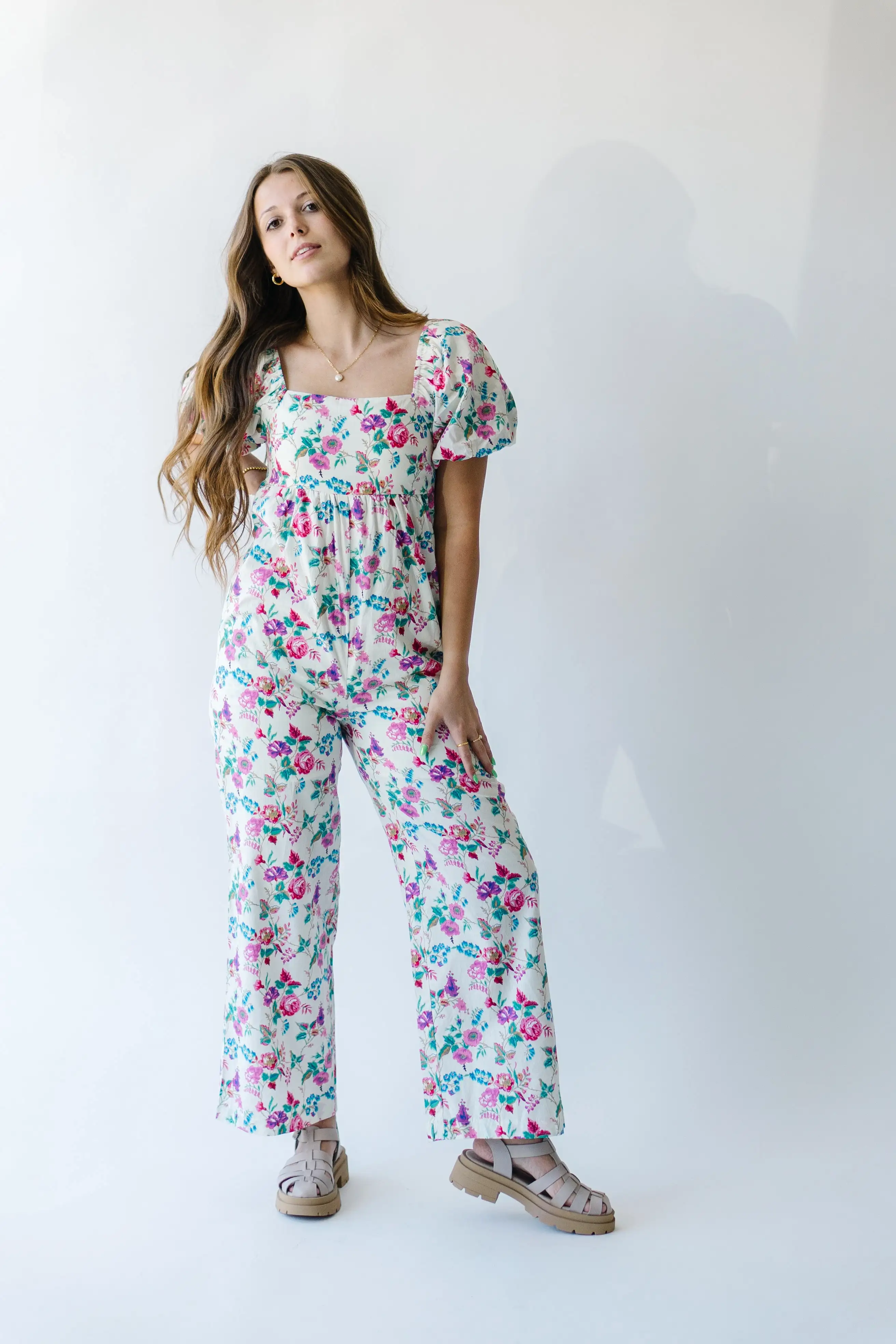 The Mackey Puff Sleeve Jumpsuit in Cream Floral