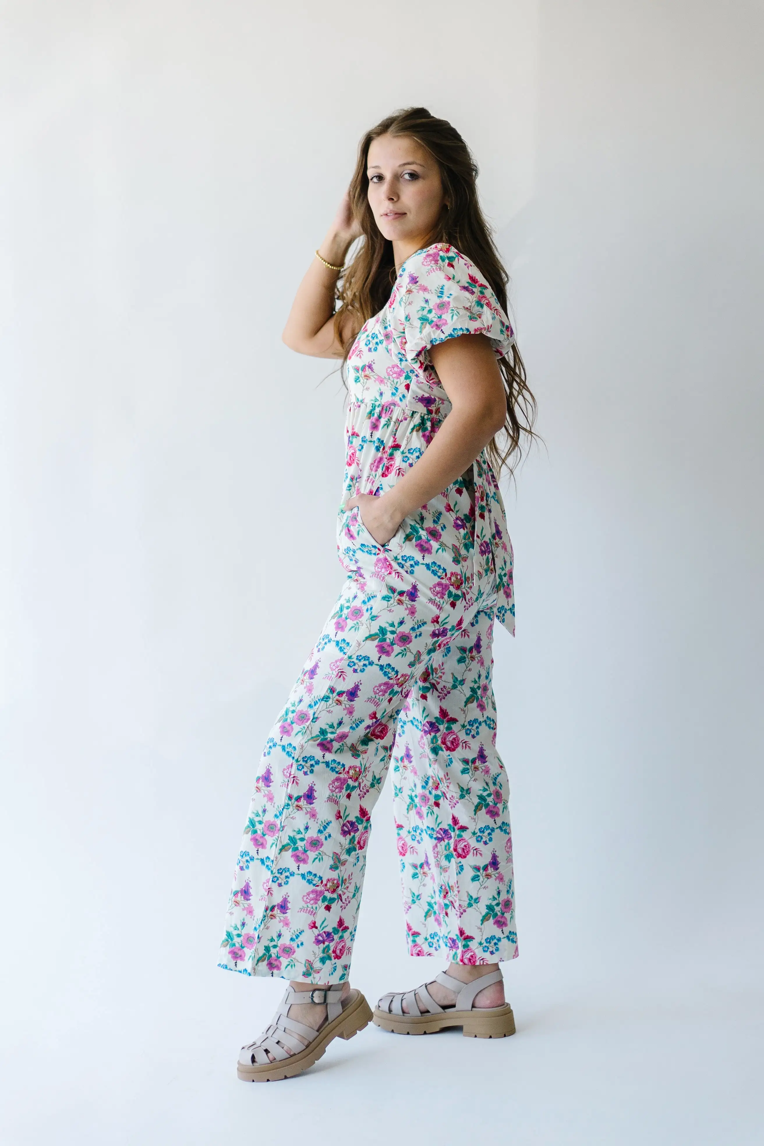 The Mackey Puff Sleeve Jumpsuit in Cream Floral